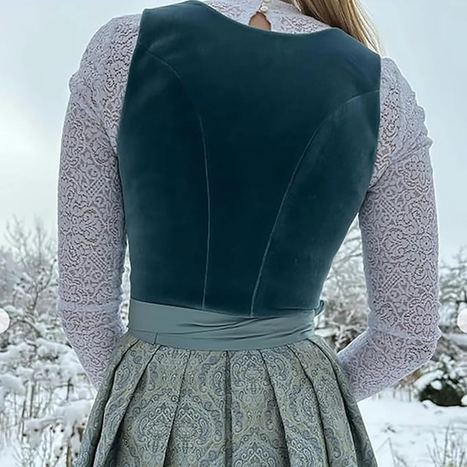 Elegant women's dirndl for Oktoberfest with vintage lacing and charming apron design