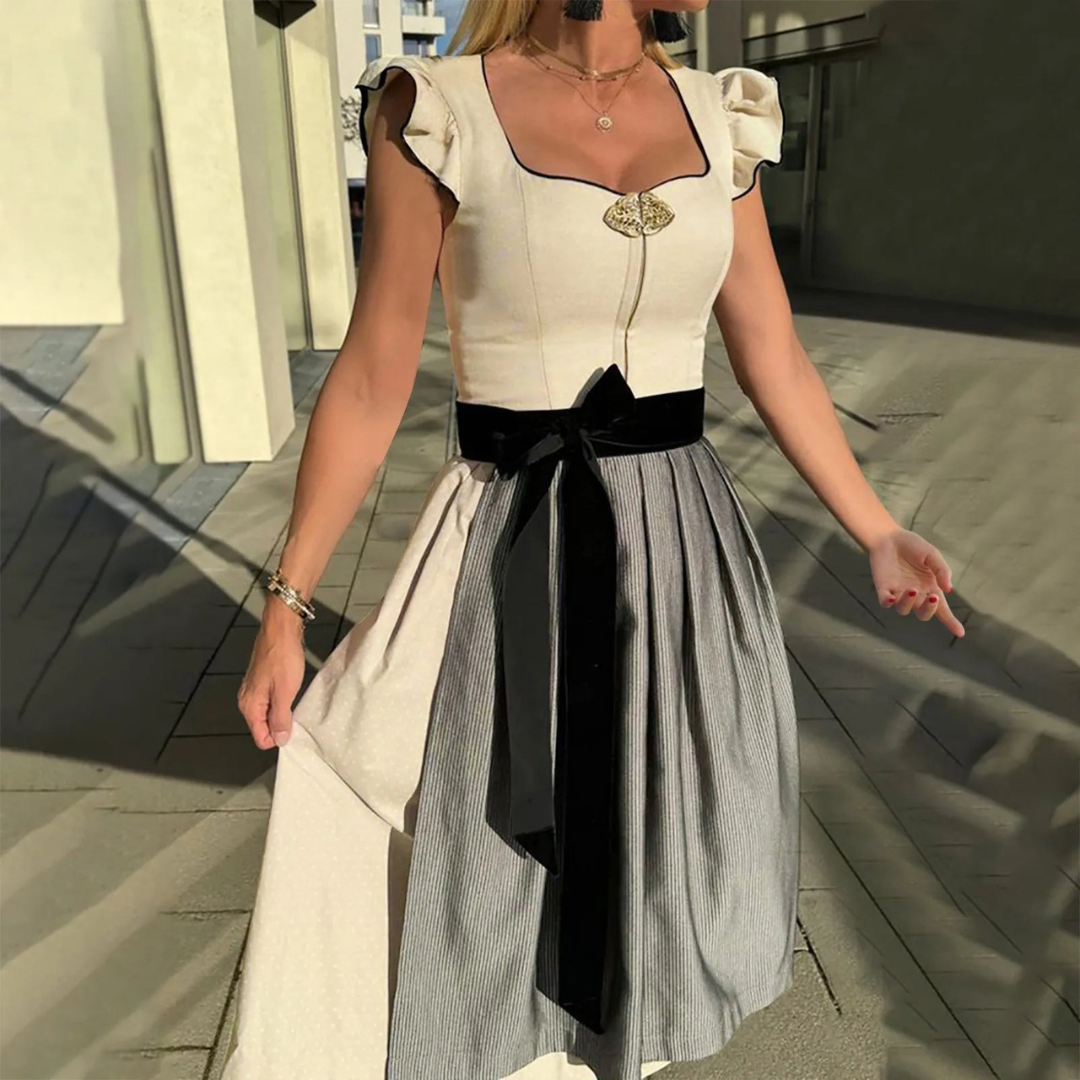 Elegant Women's Oktoberfest Dirndl with Chic Apron, Flattering Corset, and Authentic Traditional Details